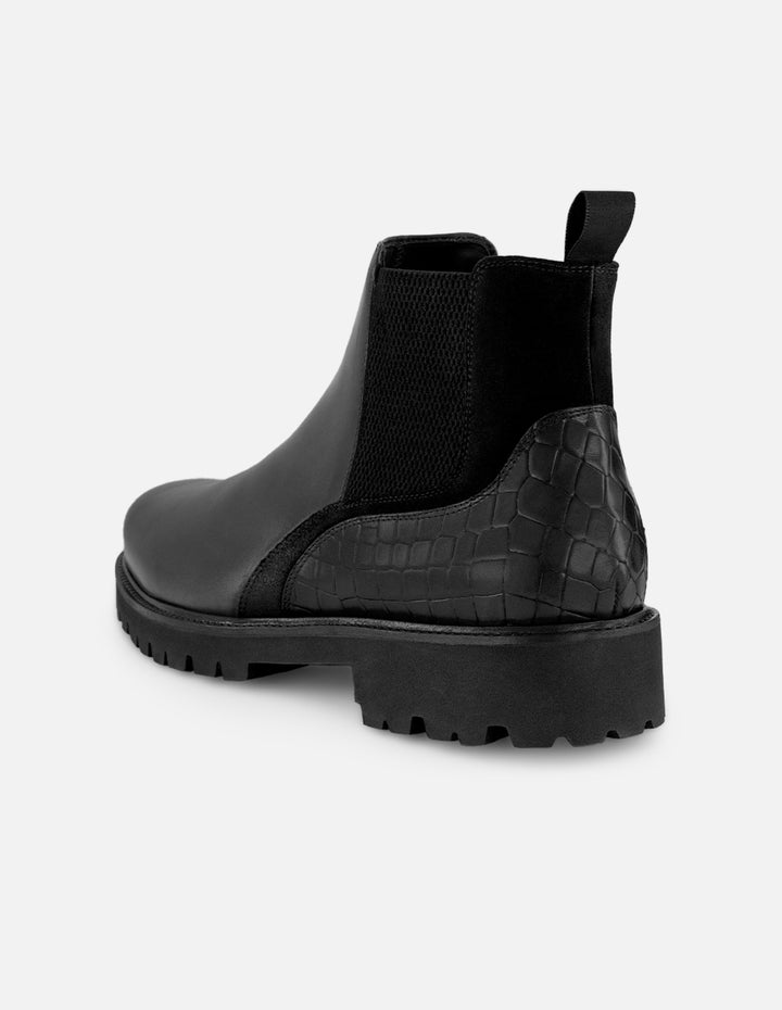 Botines Chelsea negros de piel tipo coco para hombre con suela ligera