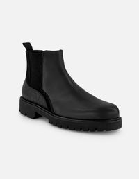 Botines Chelsea negros de piel tipo coco para hombre con suela ligera