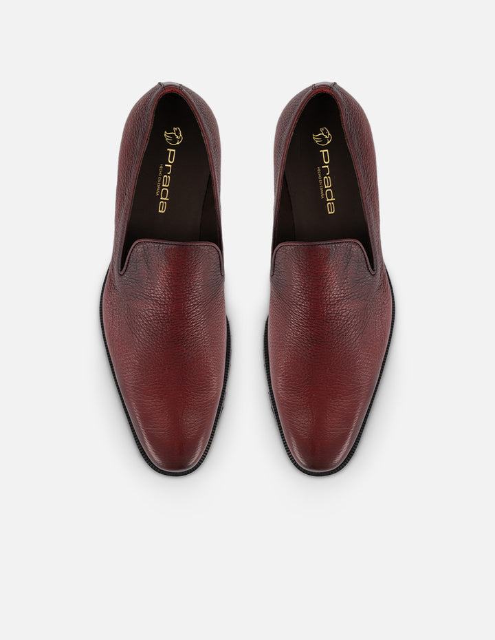Mocasines vino en piel bombeada para hombre con suela dentada
