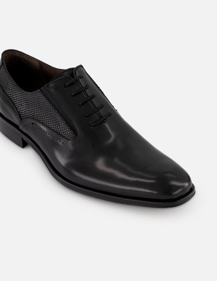 Zapato Inglés negro de piel para hombre con elásticos laterales