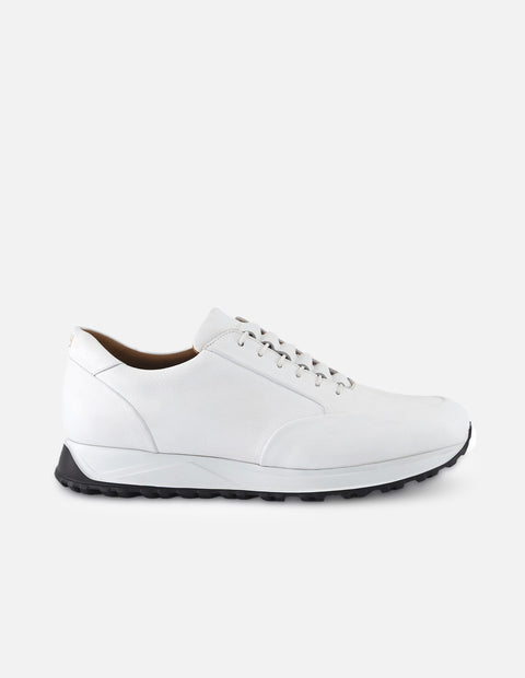 Tenis color blanco en piel con suela deportiva para hombre