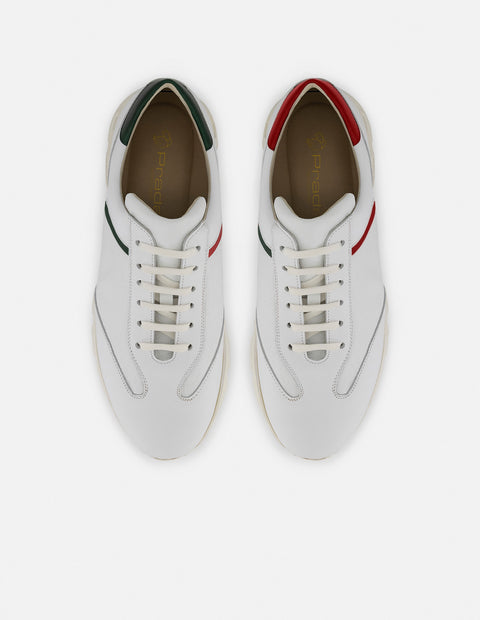 Tenis con ribete en rojo y verde en piel color blanco para hombre