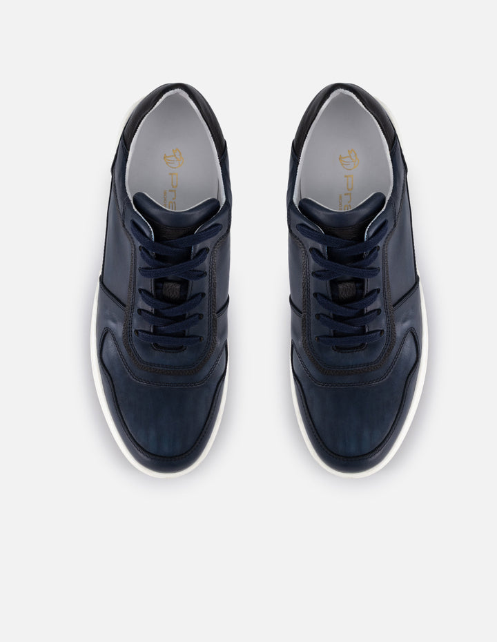 Tenis color azul en piel para hombre