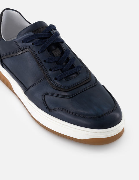 Tenis color azul en piel para hombre