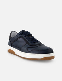 Tenis color azul en piel para hombre