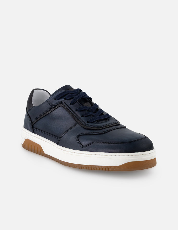 Tenis color azul en piel para hombre