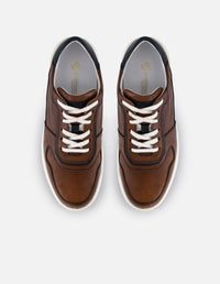 Tenis color café en piel para hombre