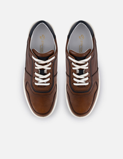 Tenis color café en piel para hombre