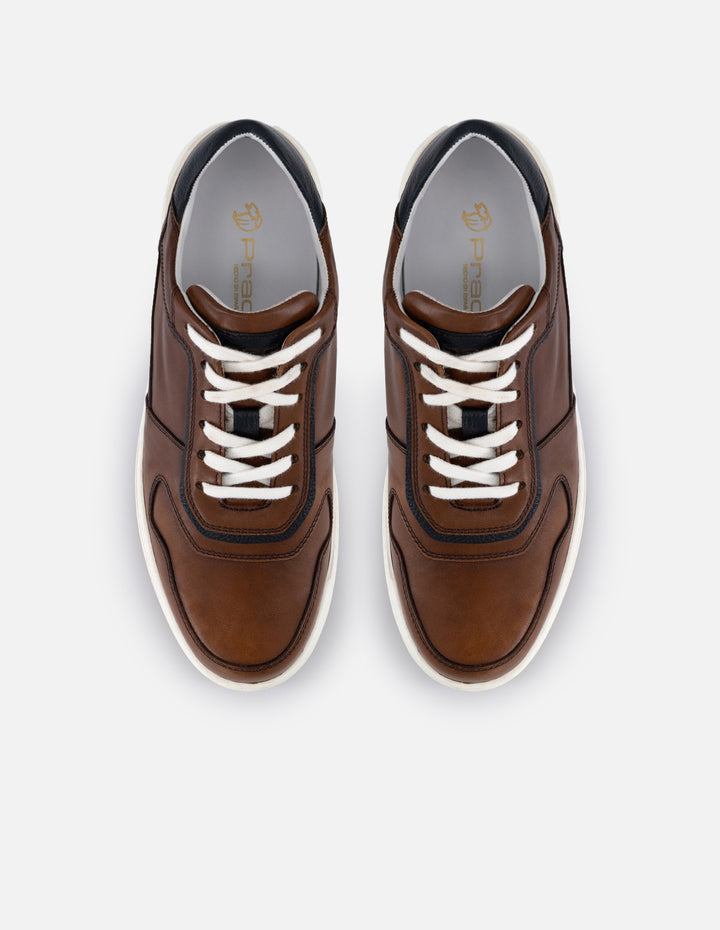 Tenis color café en piel para hombre