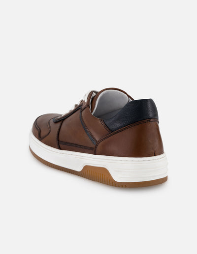 Tenis color café en piel para hombre