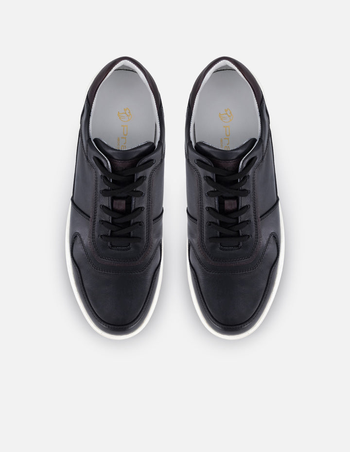 Tenis color negro en piel para hombre