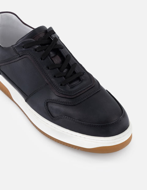 Tenis color negro en piel para hombre