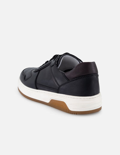 Tenis color negro en piel para hombre