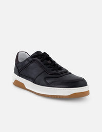 Tenis color negro en piel para hombre