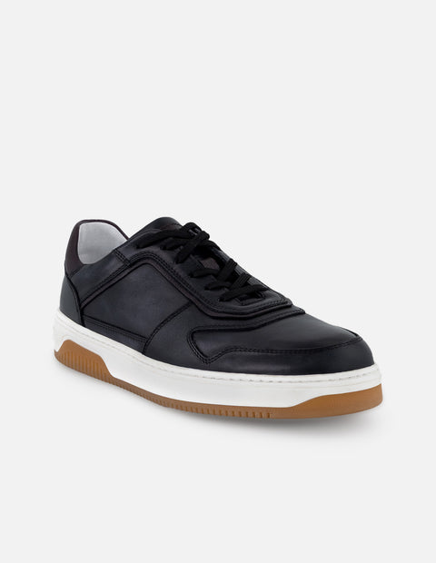 Tenis color negro en piel para hombre