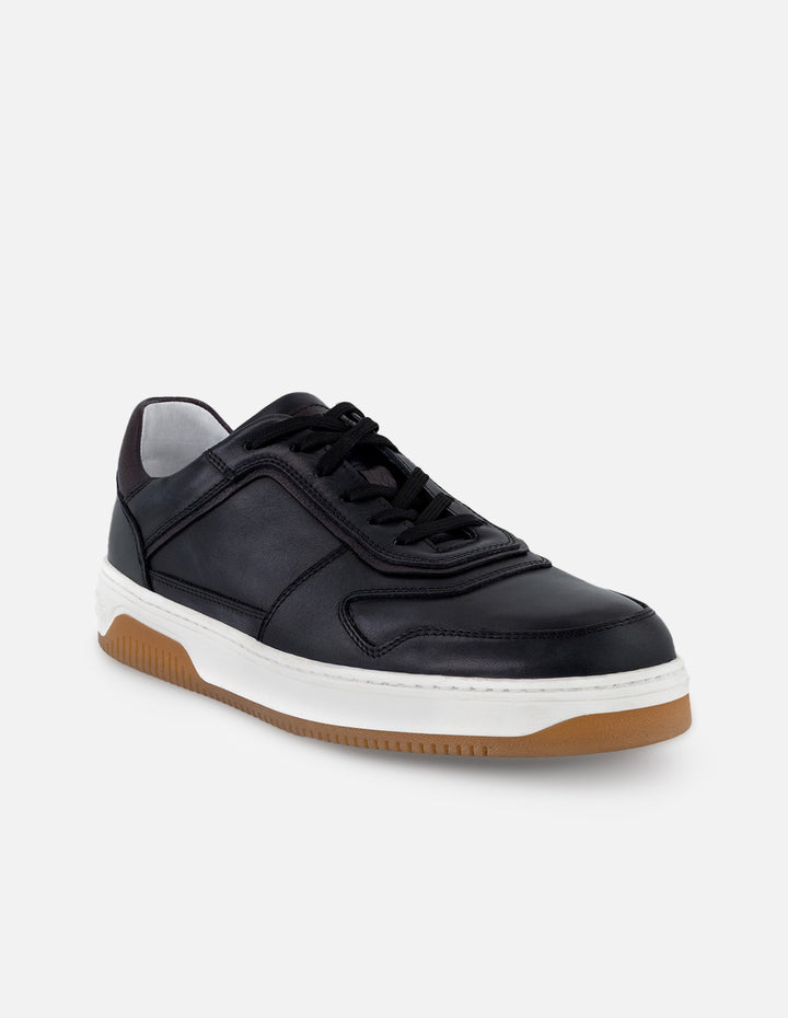 Tenis color negro en piel para hombre