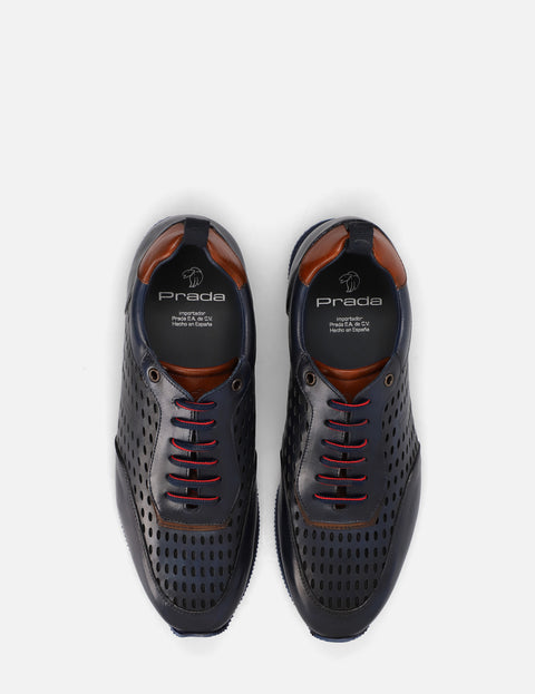 Tenis en piel con picado color marino