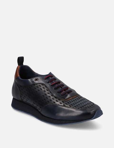 Tenis en piel con picado color marino