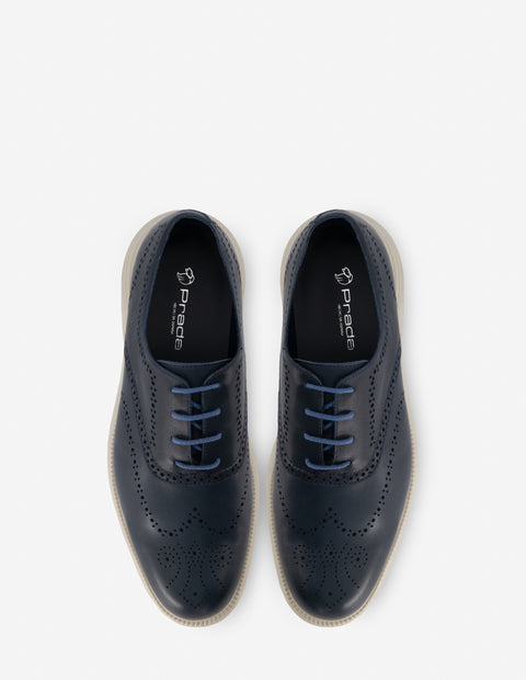 Oxford en piel con picado color azul para hombre