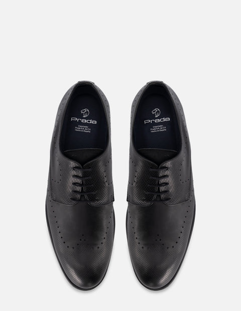 Zapato Blucher en piel color negro con picado para hombre