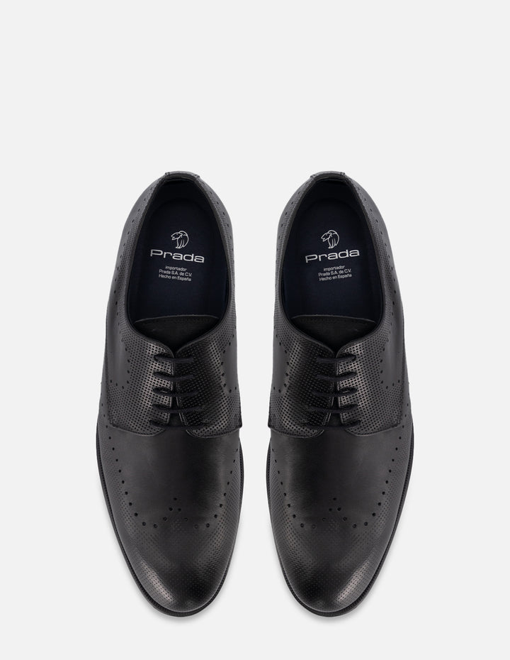 Zapato Blucher en piel color negro con picado para hombre