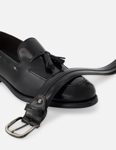 Mocasín en piel florantik color negro con borlas decorativas para hombre.