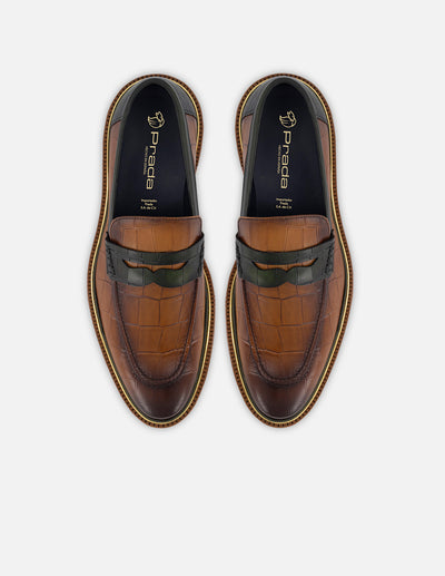 Mocasín en piel con grabado tipo coco en color caoba para hombre