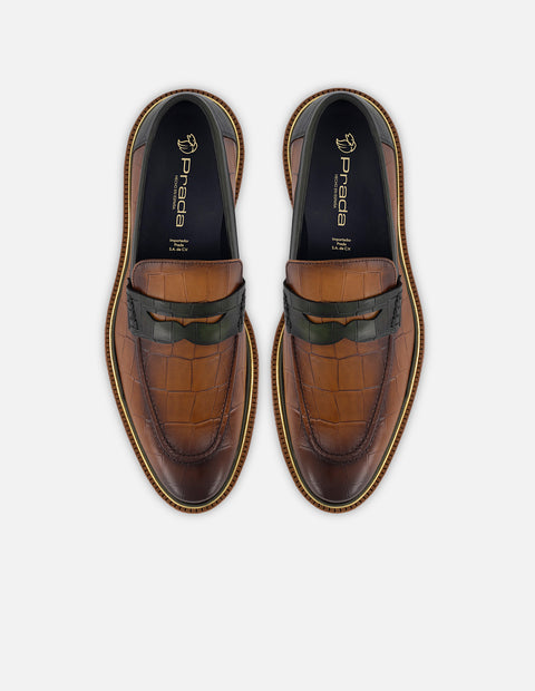 Mocasín en piel con grabado tipo coco en color caoba para hombre