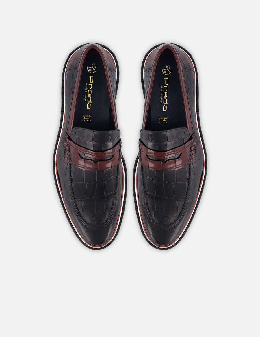 Mocasín en piel con grabado tipo coco en color vino para hombre