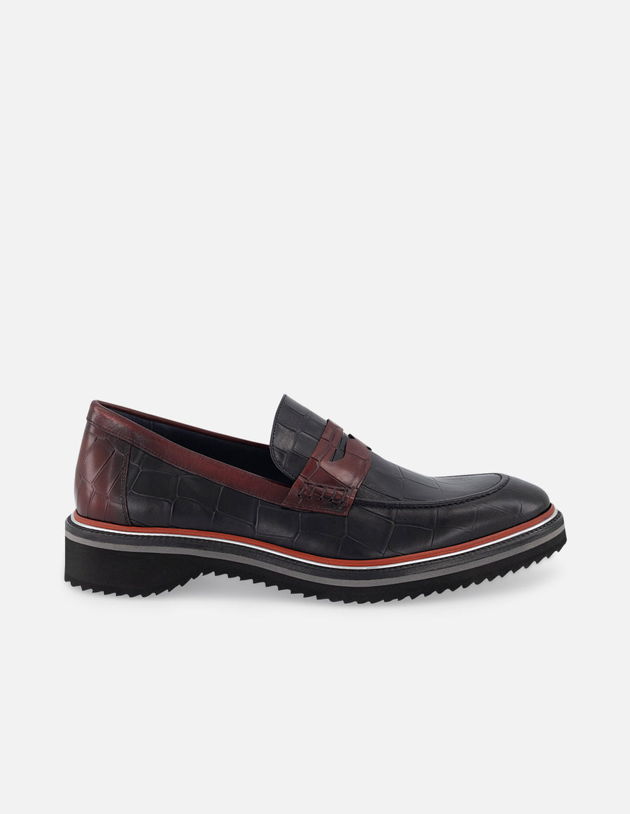 Mocasín en piel con grabado tipo coco en color vino para hombre