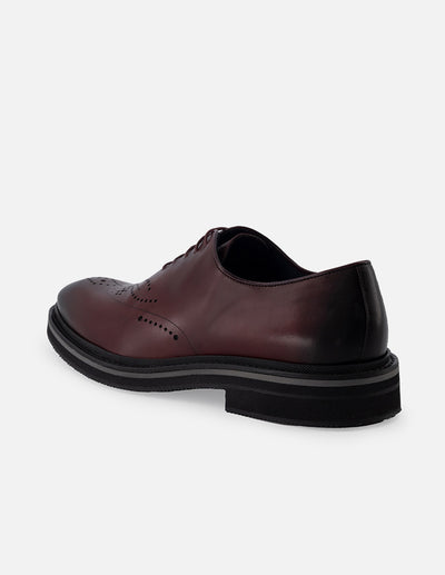 Oxford de piel con grabado tipo coco en color vino para hombre