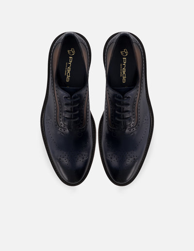 Oxford de piel color azul marino con picado María y ensombrecidos para hombre