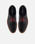 Blucher en piel napa color negro con detalles rojos y sombreado a mano para hombre