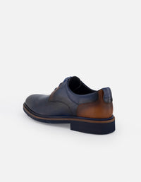 Blucher en piel napa color azul marino con detalles azules y sombreado a mano para hombre