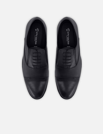 Zapato Oxford en piel napa color azul marino con puntera para hombre