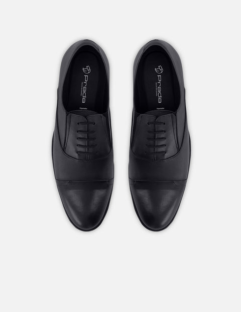 Zapato Oxford en piel napa color azul marino con puntera para hombre