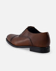 Zapato Oxford en piel napa color caoba con puntera para hombre