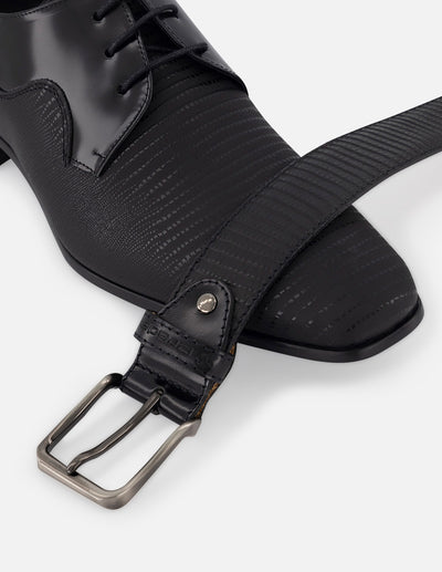 Cinturón en piel con acabado tipo tejus color negro para hombre