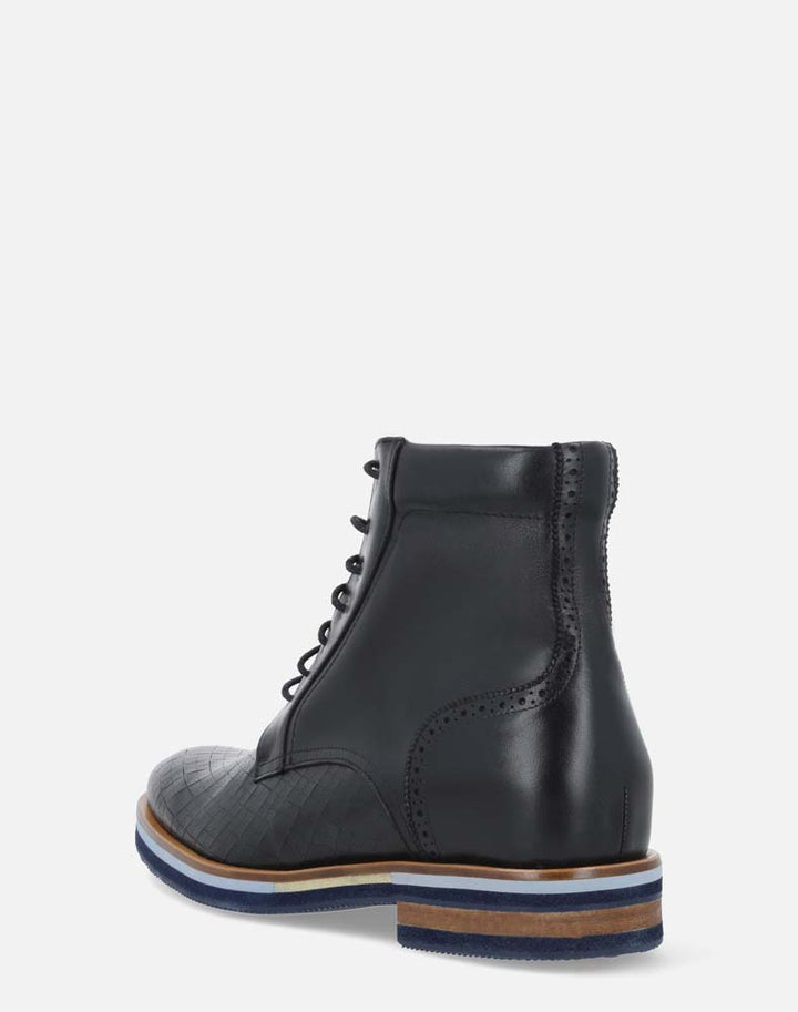 Bota de cordones +SIE7E cm de altura negra grabada para hombre