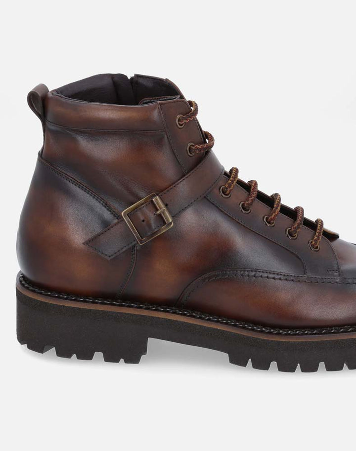 Bota de combate +SIE7E cm de altura color cuero para hombre