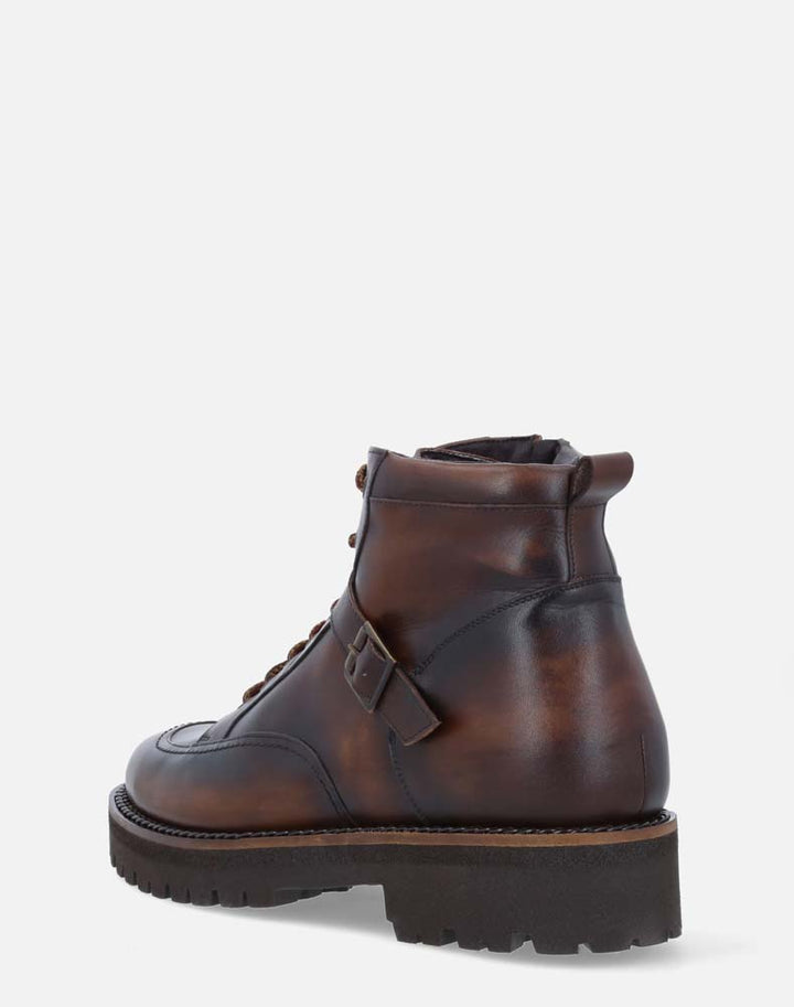 Bota de combate +SIE7E cm de altura color cuero para hombre