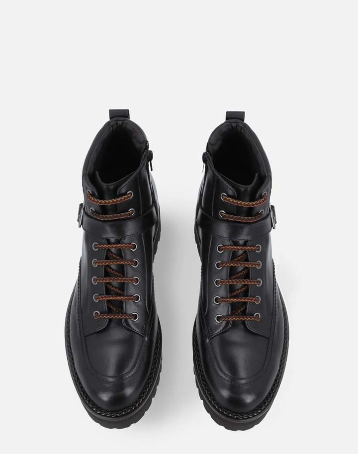 Bota de combate +SIE7E cm de altura color negro para hombre