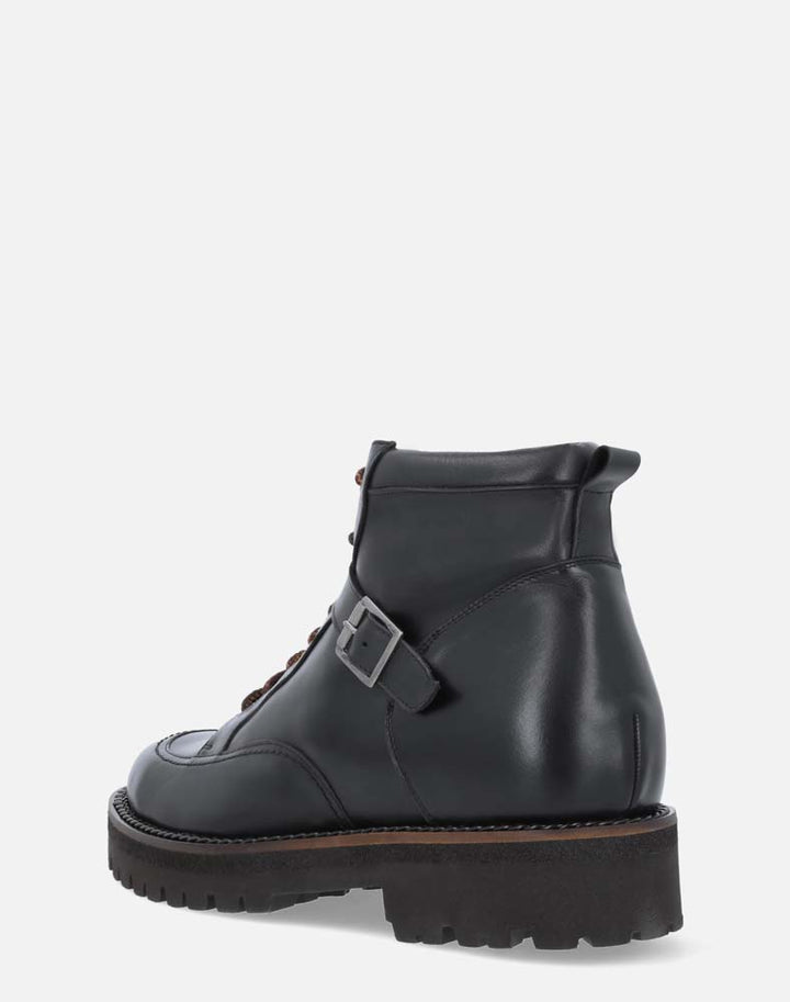 Bota de combate +SIE7E cm de altura color negro para hombre