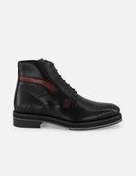 Botines negros en piel para hombre detalle tipo coco color rojo