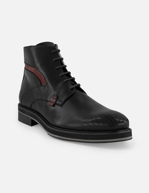 Botines negros en piel para hombre detalle tipo coco color rojo