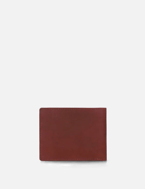 Cartera horizontal en piel color vino.