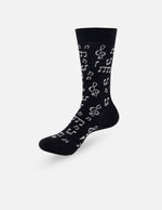 Calcetin color negro en contraste con notas musicales en blanco para hombre