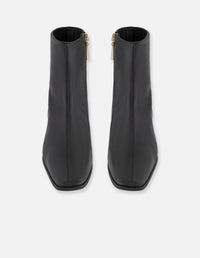 Botines negro piel para mujer con cierre lateral visible
