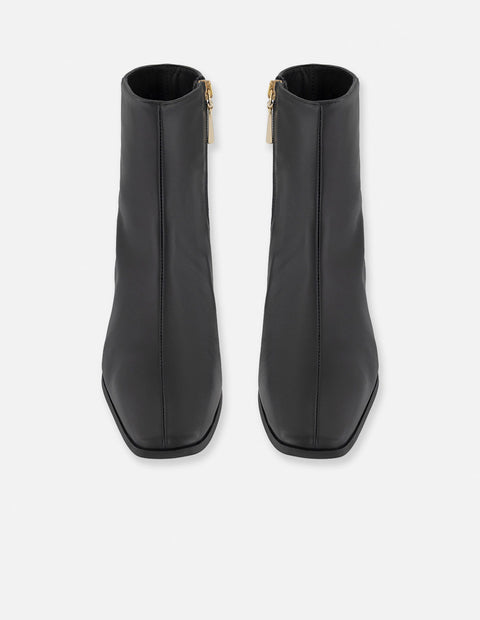 Botines negro piel para mujer con cierre lateral visible