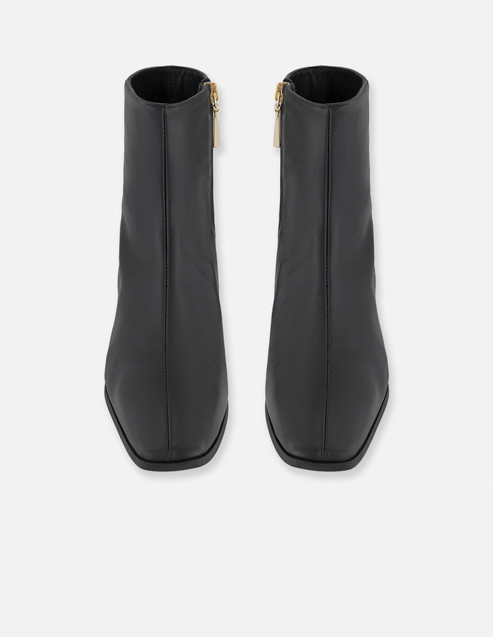 Botines negro piel para mujer con cierre lateral visible
